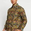 Long sleeve shirt Didesain etnik dalam batik printing Pointed collar Front button opening Material : Cotton